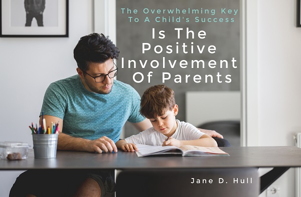 Father and son doing homework with Jane D Hull quote